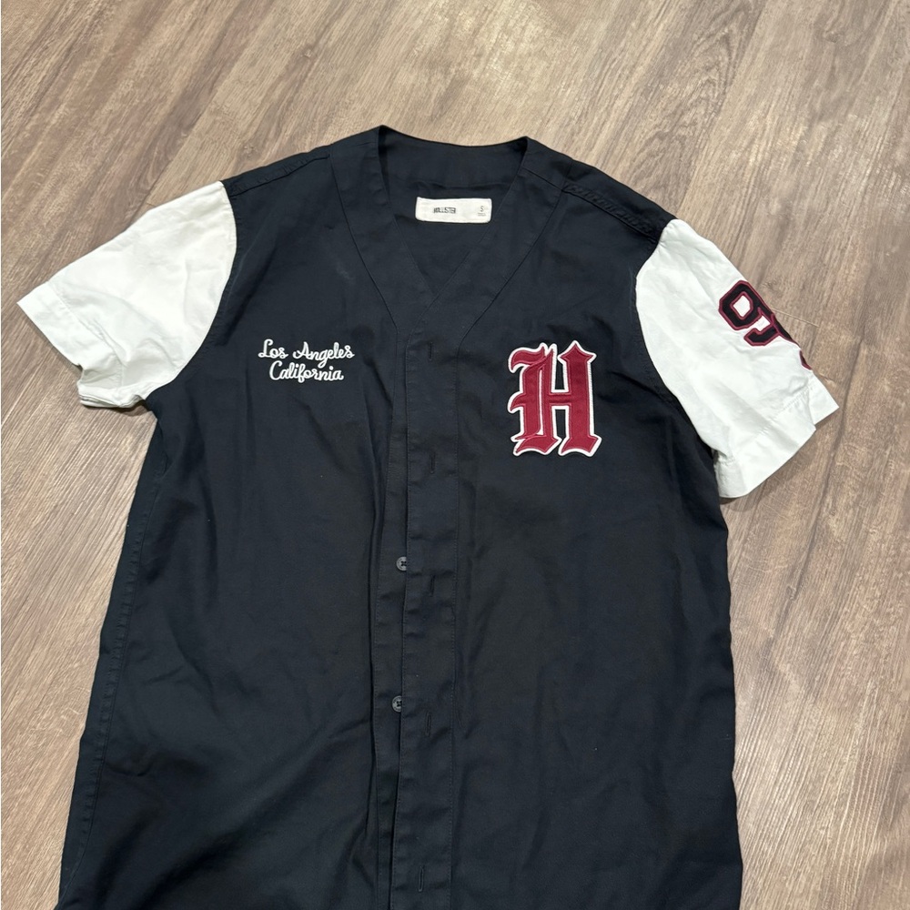 Black and White Button-Up Jersey with Red Lettering
